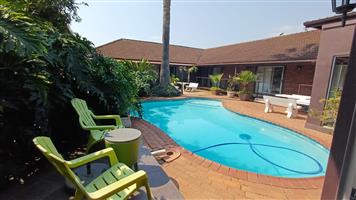 Modern 12-Bedroom Home with Cottage