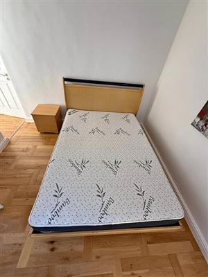 Solid Wooden bed set for double mattress. Good condition. Matress not included .