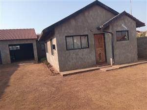I am selling a 4 room house with 2 garages
