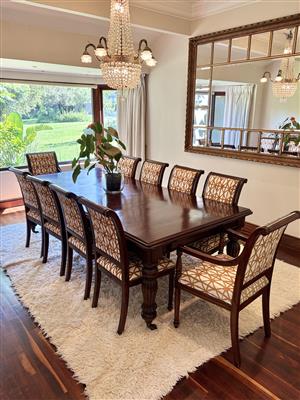 mahogany table and 10 chairs 2,1m exendable  to2,6m by 2,1m wide.