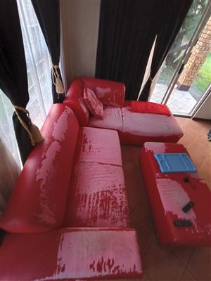 L SHAPED RED COUCH in need of reupholstering