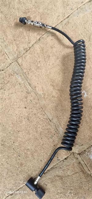 Remote Hose with slide check for paintball