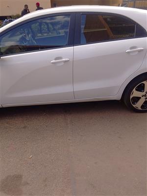 Kia Rio 2014  contact Person Mr.Mike 4 doors  power window  Take with Lather sit