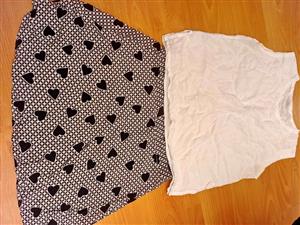 Skirt & top set black and white   Skirt size 38, length 45cm Shirt with applique size L, Length 58cm