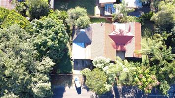 Spacious Corner Property with Endless Potential!