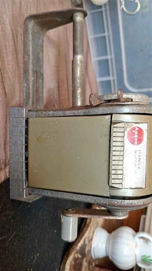 vintage Apsco Dandy Super 10 hand-crank pencil sharpener.