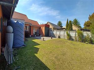 Neat Family Home with Solar, JoJo Tank & Excellent Security – Secunda