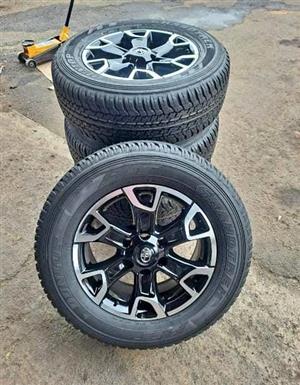 18inch Toyota Legend 50 original mags with brand new 265/60/18 Dunlop Grandtrek A/T set 