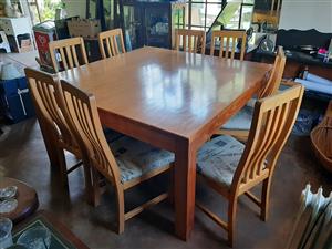 Eight-seater, square, pine diningroom chairs with eight, oak, padded chairs