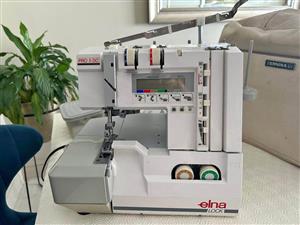Elna overlocker. Works perfectly, just needs a service. 