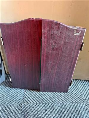 Dardboard in wooden case