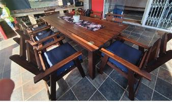 Solid wooden table and 8 chairs for sale