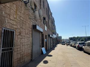 Prime Development Opportunity .Versatile Factory or Warehouse with 30 Lettable Rooms on Top Floor