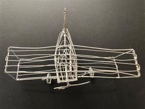 Handmade wire biplane with moving propeller
