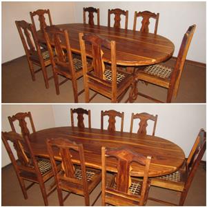 Teak 8 seater dining table and chairs