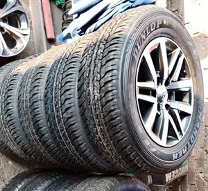 18inch Toyota Toyota Hilux/Fortuner original mags with new 265/60/18 Dunlop A/T set