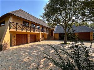 Experience Living Close to Nature in This Stunning Double-Storey Family Home