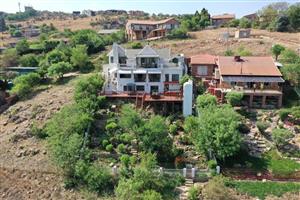 Spacious 5-Bedroom Home with River Views, Solar, and Top Security Features