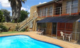 Beautiful double storey facebrick house with 4 income generating flats for sale carletonville