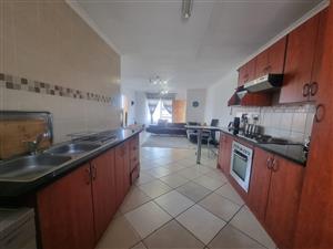 what a lovely spacious flat with a built in braai