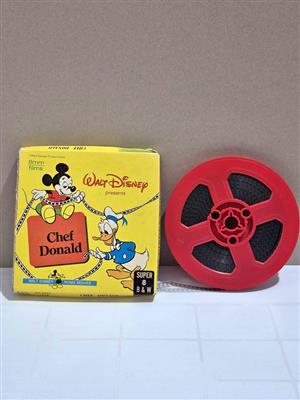 Vintage Walt Disney Super 8mm black and white home movie featuring Chef Donald.