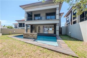 An executive 4 bedroom, 5 bathroom home in secure Izinga Park Estate