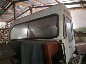 Full door white canopy for Nissan 1400 bakkie. Used but in a good condition 