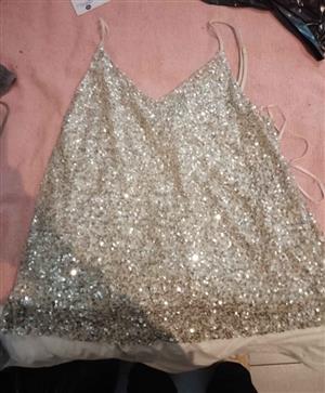 Ladies sequins camisole top with inner vest inside. Never worn size 10