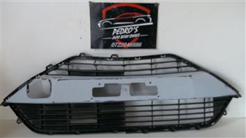 Toyota Aygo (AB40) front bumper upper grille