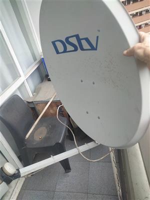 DSTV satellite dish, decoder and remote control as well as star Sat decoder 