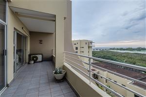 Priced to go duplex with exceptional river & sea views