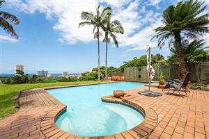 Step into a home that perfectly balances coastal charm with modern sophistication!