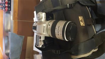 Pentac MZ-50 Camera with Pentax 28-80 Lenz complete with bag and Tripot 