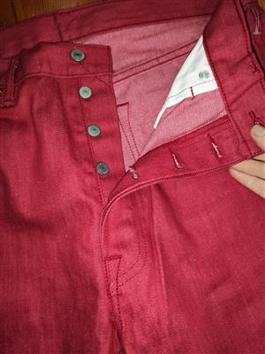 Levi Jeans Red, Men's jeans. Brand new.Straight leg size 34.