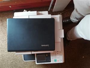 Laptop and printing machine for business 