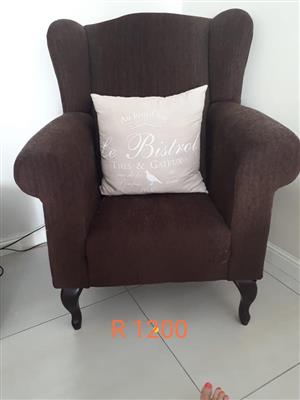 Dark brown suede chair with pillow for sale