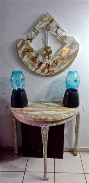 Handmade wall clock, 2 x Aqua glass lights and a half moon table. Price slightly negotiable
