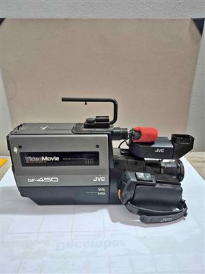 vintage JVC GF-450 VideoMovie camera that records directly to full-size VHS tapes.