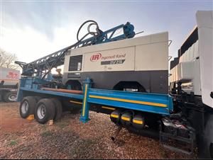 2005 Nissan UD440 Drill Rig with Ingersoll Rand Compressor