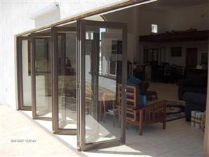 Spectrum folding doors