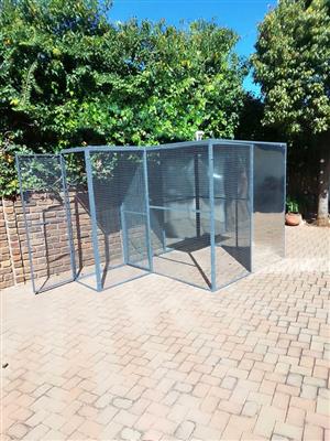 AVIARIES with a PRE-ENTRANCE to prevent birds from escaping.. 
