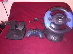 Gaming steering wheel including sepparate controls and pedals for sale