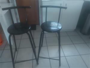 2 black bar chairs