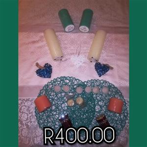 Various candles and decor mats for sale