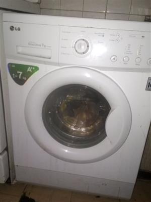 A NEAT FAIRLY USED FRONT LOAD WASHING MACHINE IS AVAILABLE FOR SALE IN ARCADIA 