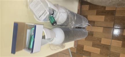 Two Oxygen bottles. One brand new and one used about 90%,with 2 regulators.