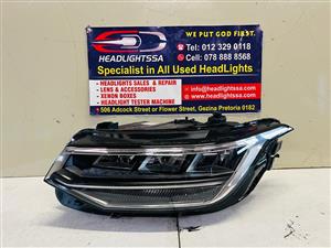 VW Tiguan left side headlight 