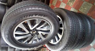 18" Nissan Navara original mags with brand new 255/60/18 Toyo 