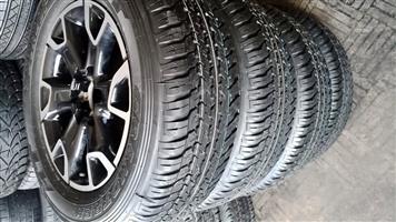 18inch Toyota Legend 50 mag with brand new 265/60/18 Dunlop Grandtrek A/T to use for spare 