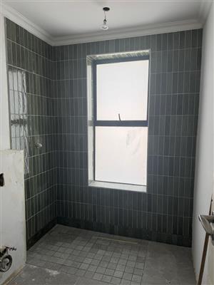 Residential and commercial building, painting, and tiling services.